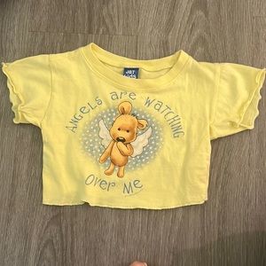 baby yellow shirt with teddy bear